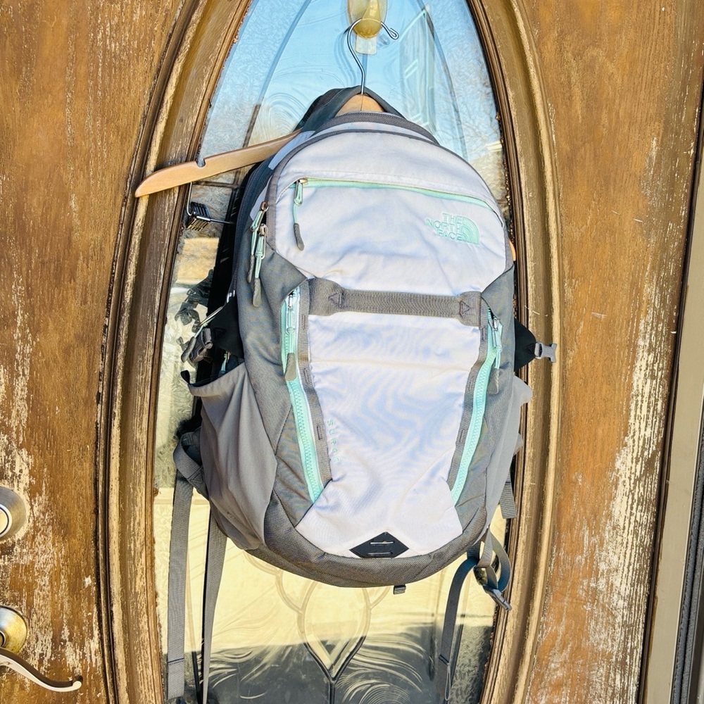 The north Face Surge whit/mint Laptop Backpack